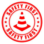 Safety first round sign isolated on white background